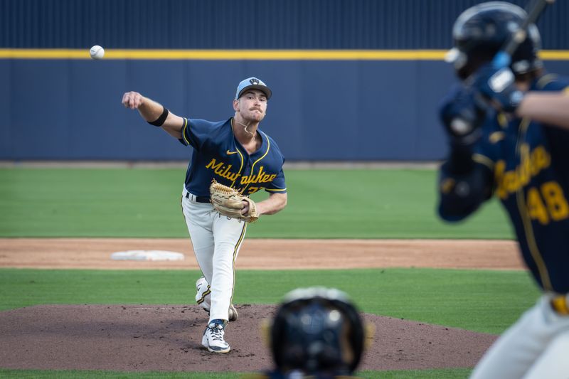 Milwaukee Brewers pitching prospect Bishop Letson pitches to Milwaukee Brewers first base prospect Eric Bitonti during spring training workouts Tuesday, February 17, 2026, at American Family Fields of Phoenix in Phoenix, Arizona.