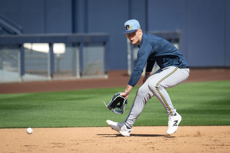 Milwaukee Brewers infielder Cooper Pratt fields a ground ball during spring training workouts Tuesday, February 17, 2026, at American Family Fields of Phoenix in Phoenix, Arizona.