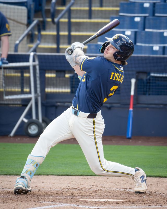 Milwaukee Brewers infield prospect Andrew Fischer hits during spring training workouts Tuesday, February 17, 2026, at American Family Fields of Phoenix in Phoenix, Arizona.
