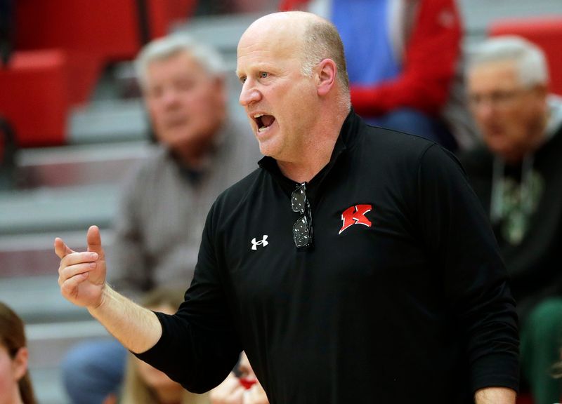 Kimberly High School's head coach Dave Lepisto leads his team against Neenah High School during their girls basketball game Thursday, February 19, 2026, at Neenah High School in Fox Crossing, Wisconsin. Kimberly won 64-50.