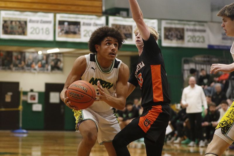 Oshkosh North's Tylan Lister drives to the basket against Kaukauna at Oshkosh North High School on Thursday, Feb. 26, 2026. Kaukauna beat Oshkosh North, 71-70.