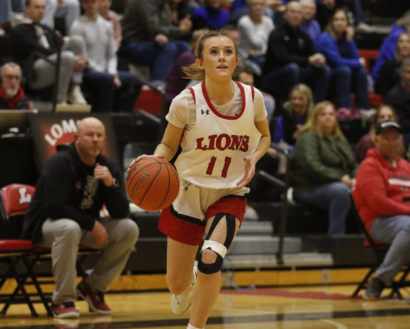 Lomira's Jadalee Luedtke drives to the basket against Winnebago Lutheran at Lomira High School on Friday, Feb. 27, 2026. Lomira defeated Winnebago Lutheran, 54-37.