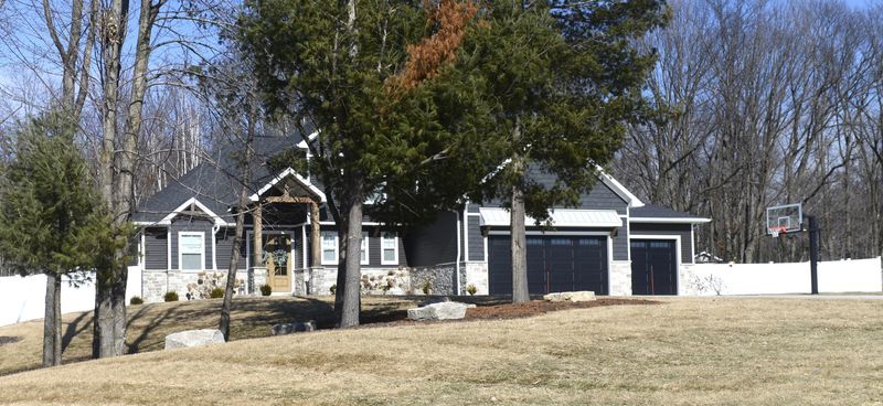 Former Green Bay Packers coach Ryan Downard listed his house at 692 Blackberry Court in Hobart. Downard now is with the Miami Dolphins.