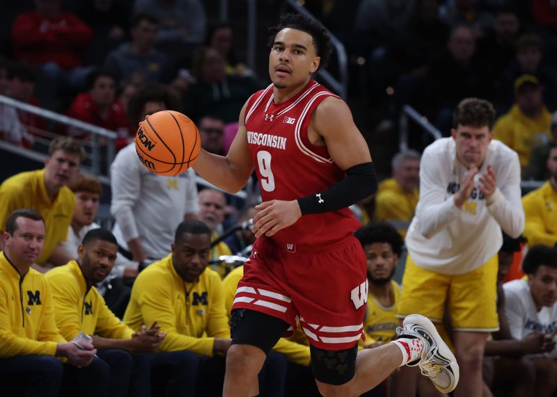 Mar 16, 2025; Indianapolis, IN, USA; Wisconsin Badgers guard John Tonje (9) dribbles downcourt during the second half against the Michigan Wolverines during the 2025 Big Ten Championship Game at Gainbridge Fieldhouse. Mandatory Credit: Trevor Ruszkowski-Imagn Images