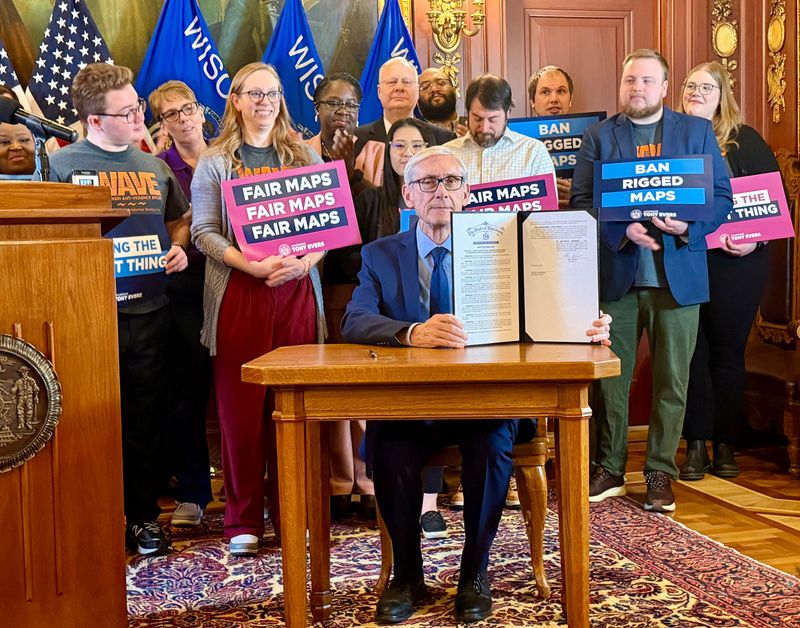 Gov. Tony Evers signed an executive order on March 3, 2026, at the state Capitol in Madison calling lawmakers into a special session next month to permanently ban partisan gerrymandering in Wisconsin.