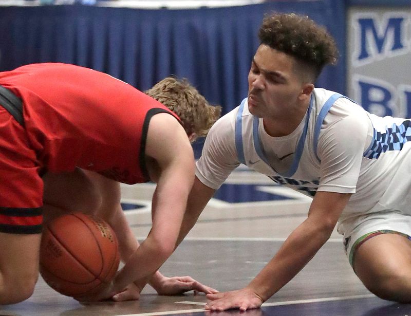 Menasha High School's Xavier John (10) against Shawano High School's Anderson Schmidt (5) during their D2 boys basketball regional quarterfinal on Tuesday, March 3, 2026 in Menasha, Wis. Menasha defeated Shawano 83-60.
Wm. Glasheen USA TODAY NETWORK-Wisconsin