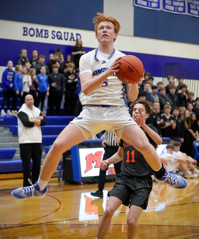 Kohler’s Carter Zimmermann (15) launches near the basket for a shot during the WIAA Div. 4 Regional, Tuesday, March 3, 2026, in Kohler, Wis.