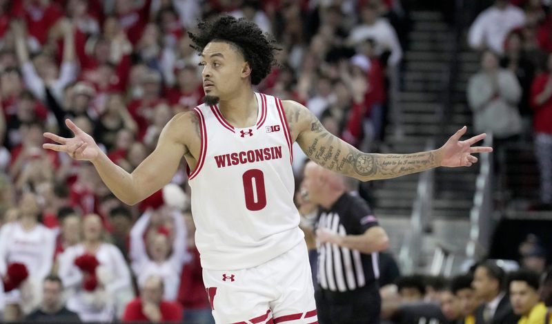 Wisconsin guard Braeden Carrington (0) celebrates his three-point basket during the first half of their game against Maryland Wednesday, March 4, 2026 at the Kohl Center in Madison, Wisconsin.