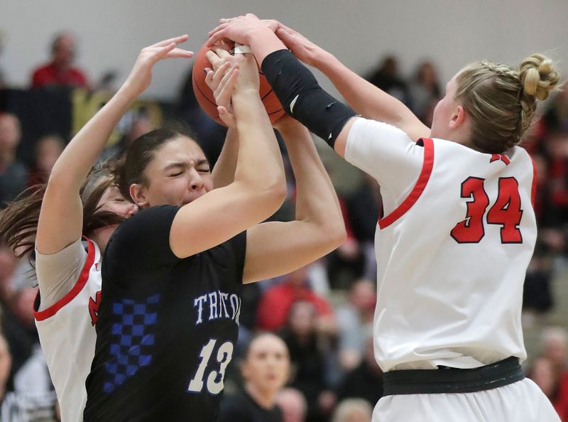 Green Bay Notre Dame's Kaia Waldrop (13) against Kimberly High School's Ava Van Vonderen (34) and Kendyll Brochtrup (4) during thier D1 girls basketball sectional semifinal on Thursday, March 5, 2026 at Appleton North High School in Appleton, Wis. Notre Dame defeated Kimberly 54-48.
Wm. Glasheen USA TODAY NETWORK-Wisconsin