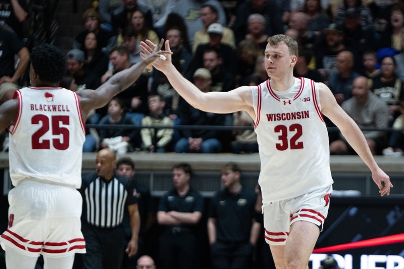 Wisconsin Badgers forward Aleksas Bieliauskas (32) and guard John Blackwell combined to hit 9 of 15 3-pointers against Purdue.