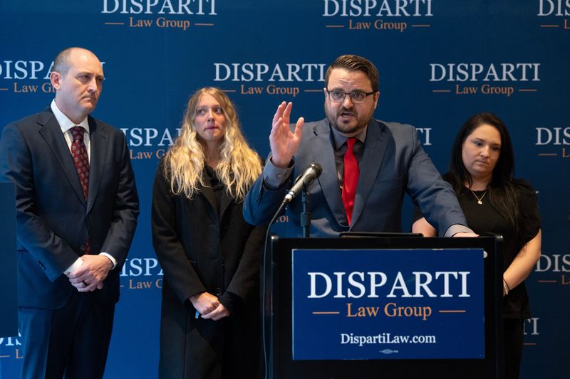 Attorney Cass Casper speaks about the lawsuit his clients Grace Williams, Amanda Watzka and others have put forward against the Oconto Falls Public School District, which details their alleged sexual abuse from teachers and coaches, during a press conference in the at the Kimpton Journeyman Hotel on the morning of March 11, 2026 in Milwaukee, Wisconsin.