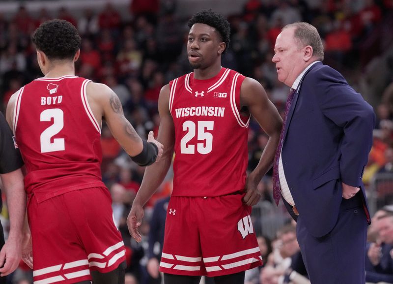 Wisconsin head coach Greg Gard talks with guard John Blackwell (25) during the second half of their quarterfinal game in the Big Ten tournament Friday, March 13, 2026 at the United Center in Chicago, Illinois. Wisconsin beat Illinois 91-88.