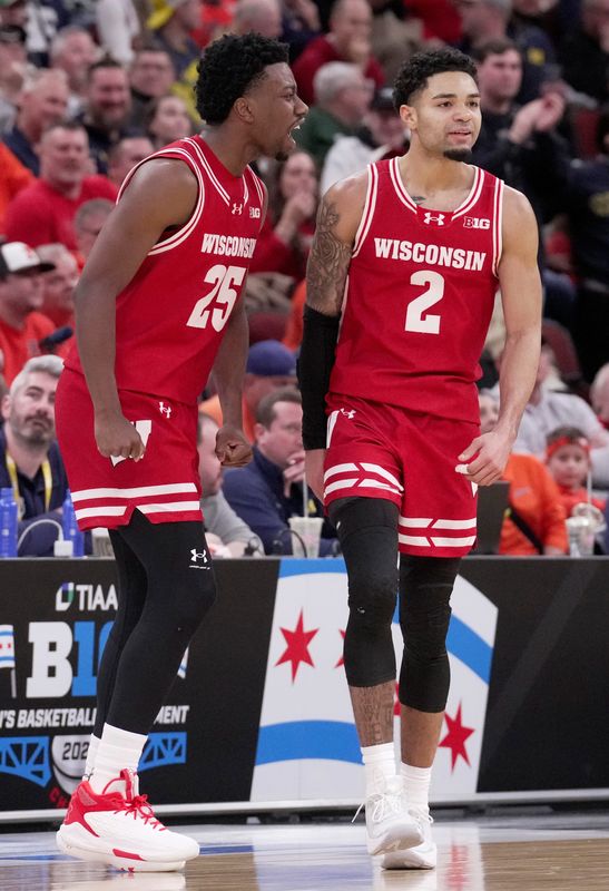 Wisconsin guard John Blackwell (25) reacts after Wisconsin guard Nick Boyd (2) was fouled during the second half of their quarterfinal game in the Big Ten tournament Friday, March 13, 2026 at the United Center in Chicago, Illinois. Wisconsin beat Illinois 91-88.