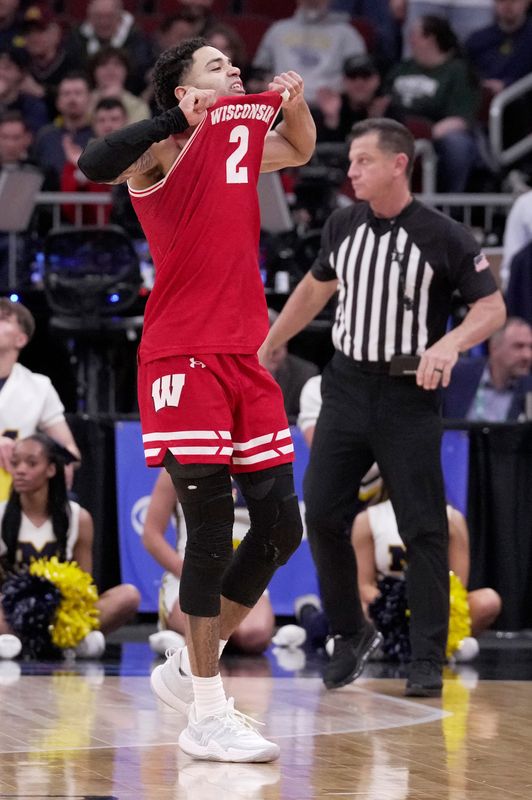 Wisconsin guard Nick Boyd (2) engages Michigan fans during the second half of their semifinal game in the Big Ten tournament Saturday, March 14, 2026 at the United Center in Chicago, Illinois. Michigan beat Wisconsin 68-65.