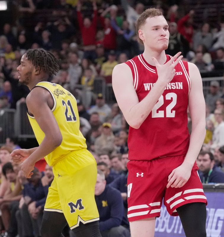Wisconsin forward Austin Rapp celebrates a 3-point basket against Michigan in the Big Ten Tournament.