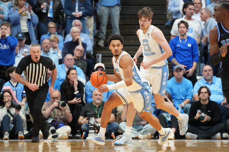 North Carolina guard Seth Trimble leads the fast break.