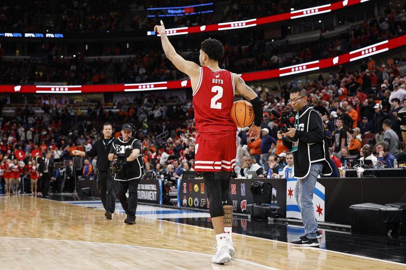 Mar 13, 2026; Chicago, IL, USA; Wisconsin Badgers guard Nick Boyd (2) celebraes after the game against the Illinois Fighting Illini at United Center. Mandatory Credit: Kamil Krzaczynski-Imagn Images