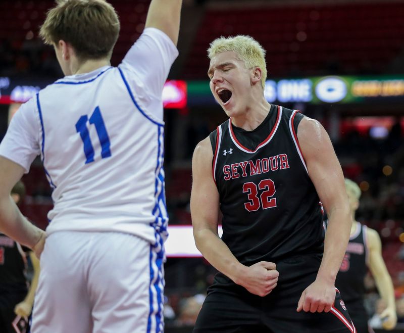 Seymour High School's Isaac Feske (32) reacts after scoring a basket against Saint Croix Central High School during a Division 3 semifinal game at the WIAA state boys basketball tournament on Thursday, March 19, 2026, at the Kohl Center in Madison, Wis. Seymour won the game, 67-49.
Tork Mason/USA TODAY NETWORK-Wisconsin