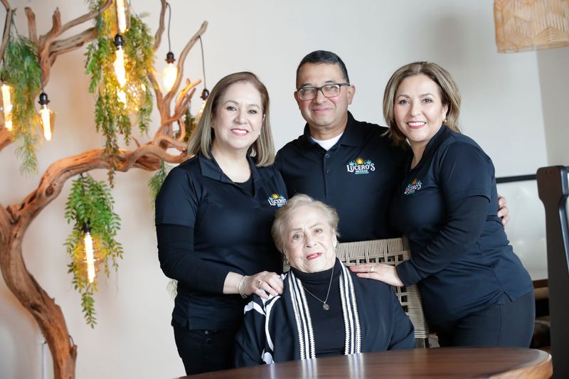 Fe Rivas Lucero, seated, Fe Rivas Lucero, Sergio Jimenez and Mary Rivas Lucero, right, are pictured March 19, 2026. Fe Rivas Lucero, Mary Rivas Lucero and Sergio Jimenez are the co-owners of Lucero’s Mexican Restaurant, 3401 E. Evergreen Drive in Appleton.