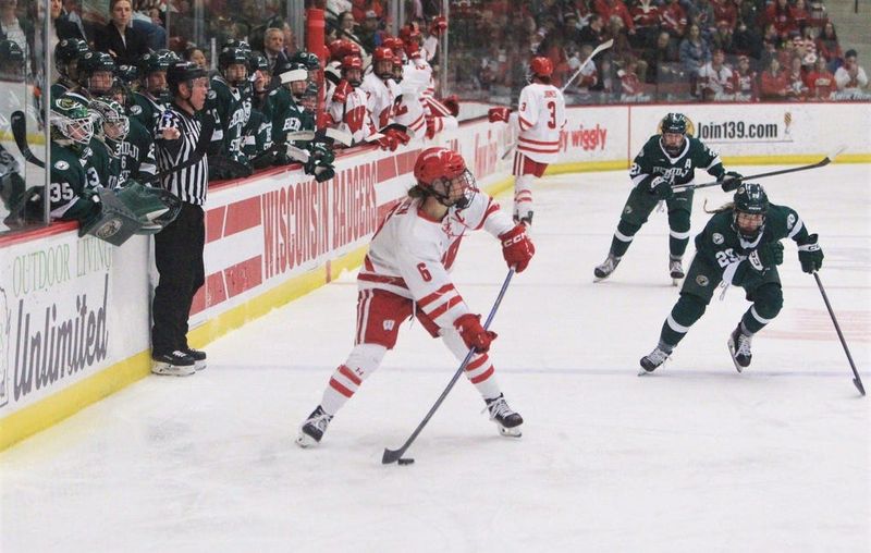 Wisconsin Lacey Eden (6) prepares to make a pass during a WCHA first-round playoff game at LaBahn Arena in Madison, Wis. on Friday Feb. 27, 2026. Wisconsin won, 7-0.