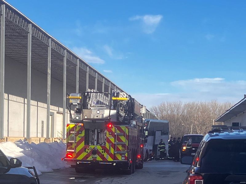 First responders and law enforcement investigate the crash of a charter bus from Chicago on March 22, 2026, between North Webster and Angie avenues in Green Bay.