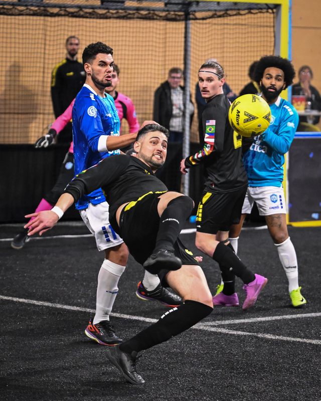 Milwaukee Wave forward Andre Hayne attempts a bicycle kick against Utica City FC in the teams' regular season finale March 29 at the UWM Panther Arena.