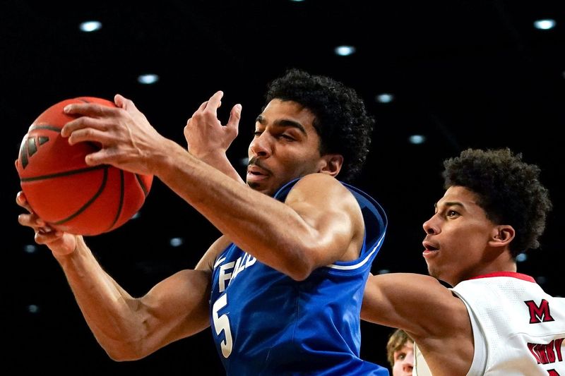 Buffalo Bulls guard Daniel Freitag (5) rebounds the ball in the first half of a NCAA menâ€™s basketball game between the Miami RedHawks and Buffalo Bulls, Saturday, Jan. 17, 2026, at Millett Hall in Oxford, Oh.