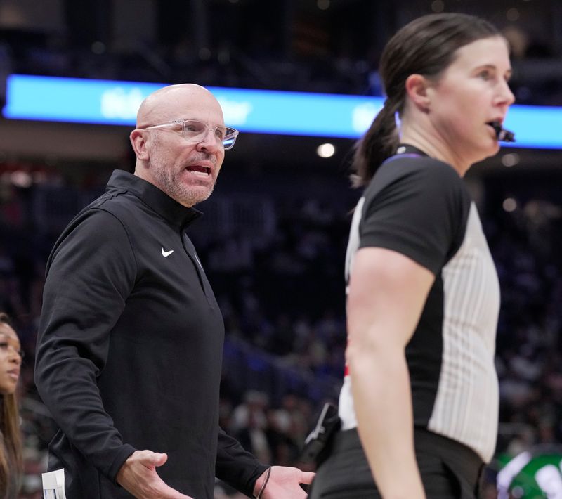 Dallas Mavericks head coach Jason Kidd questions a call by referee Natalie Sago (9) during the first half of their game against the Milwaukee Bucks Tuesday, March 31, 2026 at Fiserv Forum in Milwaukee, Wisconsin.