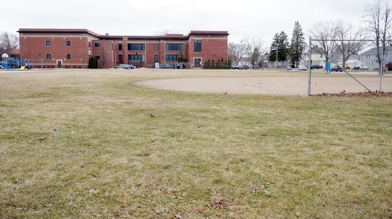 The Sheboygan Area School District is selling this plot of land behind the former Washington Elementary School, as seen April 1, 2026, in Sheboygan, Wis.