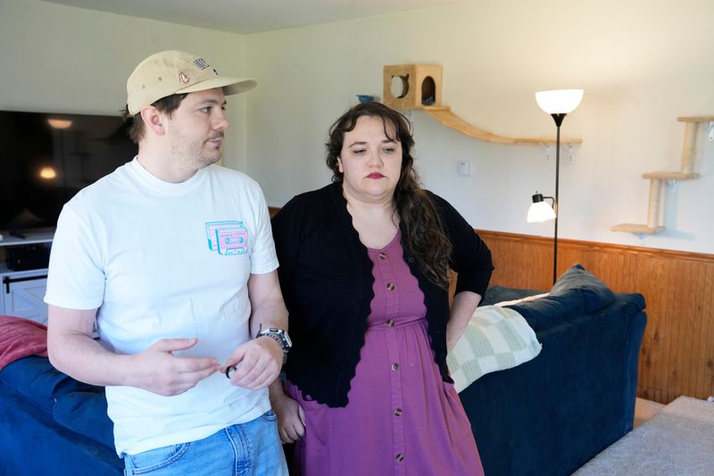 Eric Magnuson and Elizabeth Sargent in their Mequon home on March 27, 2026.