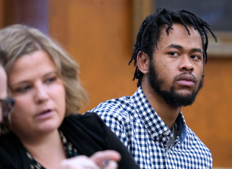 Defendant Tremaine Jones, far right, looks on while his defense attorneys Russell J.A. Jones, left and Abigail Ruckdashel, center, confer during his trial on Thursday, April 2, 2026 on day 4 at the Milwaukee County Courthouse where Circuit Judge Michelle Havas is preciding, in Milwaukee, Wisconsin. Jones is charged with first-degree intentional homicide, attempted first-degree intentional homicide and first degree recklessly endangering safety in the shooting death of Corder. Corder's partner, officer Christopher McCray, also was shot, but survived the attack.  Jones is also charged with felony possession of a short-barrel shotgun or rifle.