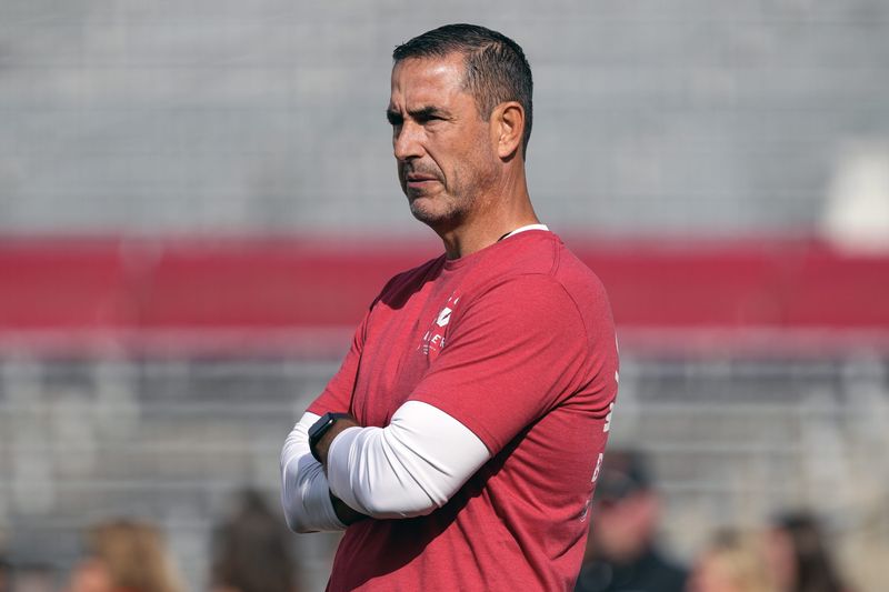 Sep 20, 2025; Madison, Wisconsin, USA; Wisconsin Badgers head coach Luke Fickell looks on during warm-ups prior to the game against the Maryland Terrapins at Camp Randall Stadium. Mandatory Credit: Jeff Hanisch-Imagn Images