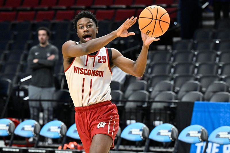 Mar 18, 2026; Portland, OR, USA; Wisconsin Badgers guard John Blackwell (25) runs a drill during a practice session ahead of the first round of the men's 2026 NCAA Tournament at Moda Center. Mandatory Credit: Craig Strobeck-Imagn Images