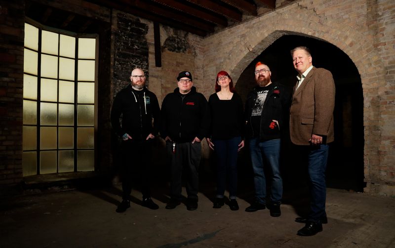 Thomas Johnson, from left, Jason Burkard, JoLinda Gorzelanczyk, Austin Esquibel and David Anderson, are among the partners opening Revelry, a new music venue inside the former Schauer & Schumacher Furniture building in downtown Green Bay. They're pictured on the second floor of the historic building at 227 E. Walnut St.