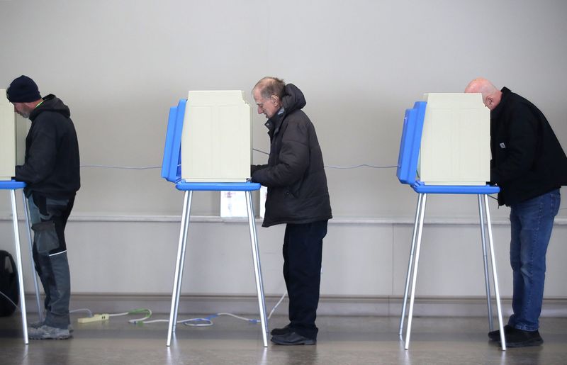 Appleton voters fill out their ballots during the April 7 election.
