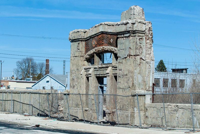 A portion of the former exterior of the former Mirro plant as seen April 9, 2026, in Manitowoc, Wis.