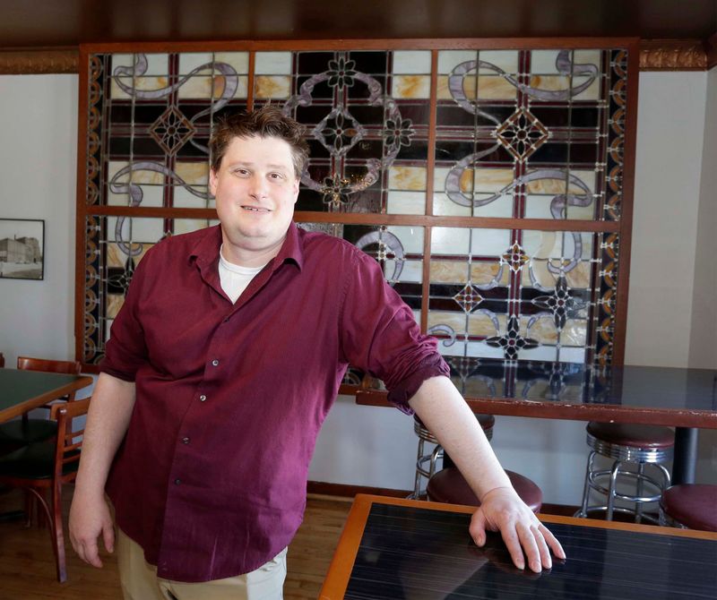 Mark Tennie, owner of soon-to-open Trattoria Tennie, poses inside his Manitowoc restaurant on April 9, 2026.