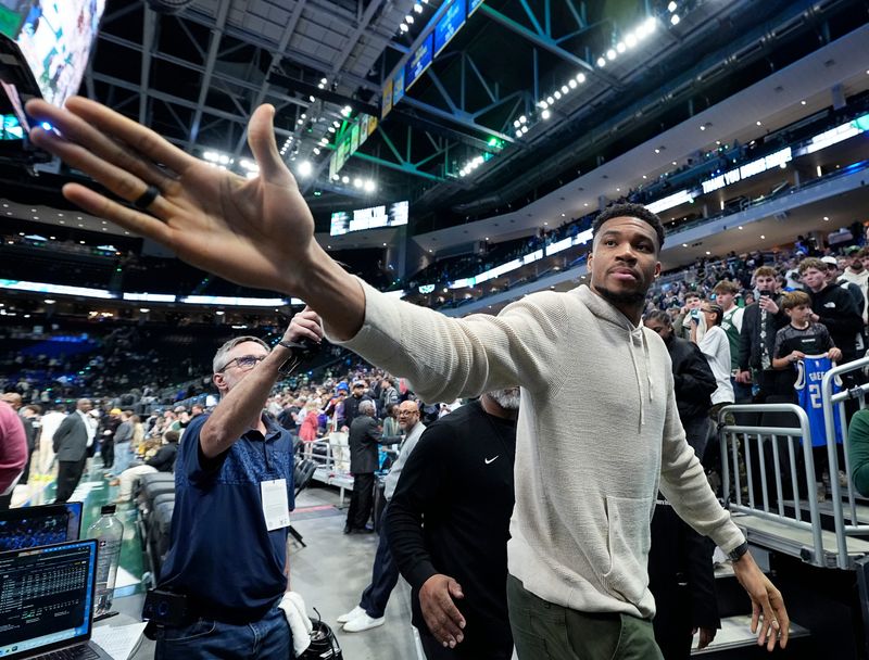 Milwaukee Bucks forward Giannis Antetokounmpo (34) waves goodbye to fans after the game against the Brooklyn Nets on Friday April 10, 2026 at Fiserv Forum in Milwaukee, Wisconsin.