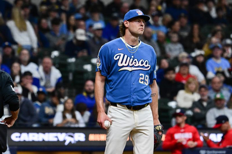 Brewers reliever Trevor Megill reacts after allowing four runs to score in the ninth inning against the Nationals on Friday, April 10 at American Family Field.