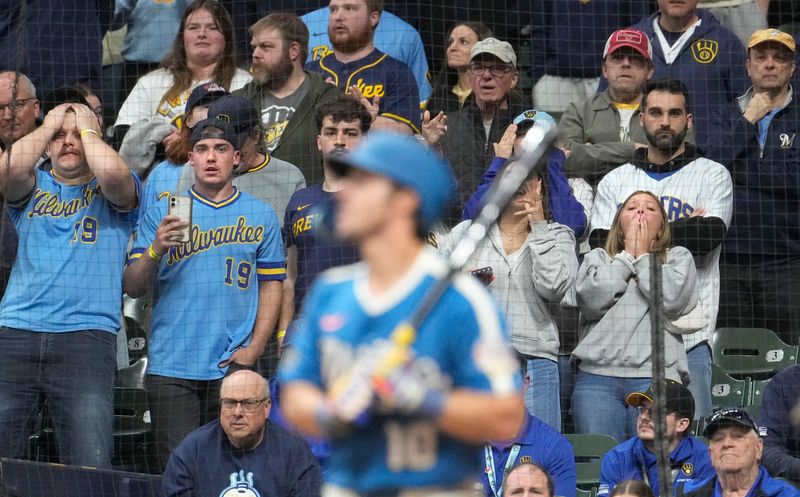 Apr 11, 2026; Milwaukee, Wisconsin, USA; Milwaukee Brewers right fielder Sal Frelick (10) strikes out as Milwaukee Brewers fans react in the ninth inning against the Washington Nationals at American Family Field. Mandatory Credit: Michael McLoone-Imagn Images