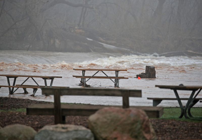 High water crestsr the banks of the Fox River at 1000 Islands Environmental Center on Tuesday, April 14, 2026 in Kaukauna, Wis.Thunderstorms and heavy overnight rain caused high water, closed roads and flood warnings in the Fox Cities.
Wm. Glasheen USA TODAY NETWORK-Wisconsin