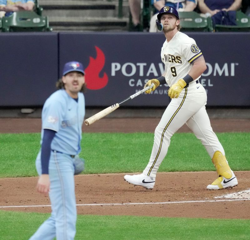 Milwaukee Brewers first baseman Jake Bauers (9) hits a three-run home run off of Toronto Blue Jays pitcher Kevin Gausman during the fourth inning of their game Tuesday, April 14, 2026 at American Family Field in Milwaukee, Wisconsin.