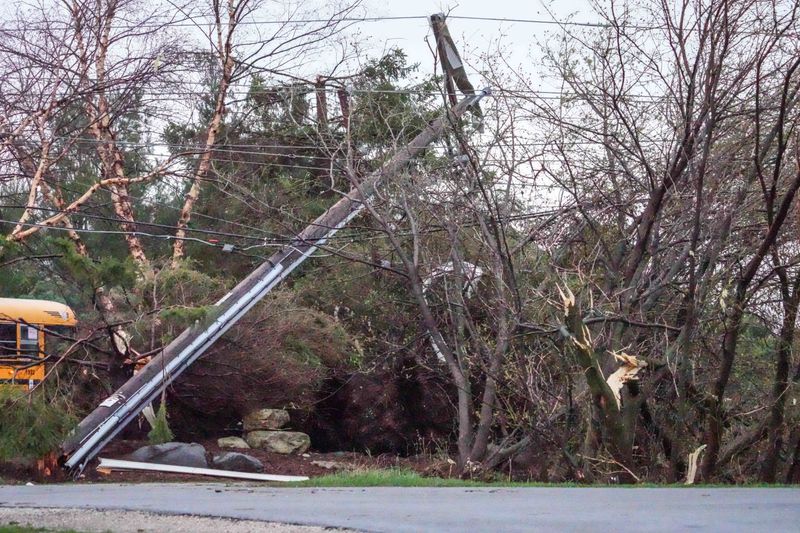 Power lines and trees are damaged at Hillside Meadows in Sussex, Wisconsin on the morning of April 15, 2026, after a tornado passed through the area on Tuesday evening.