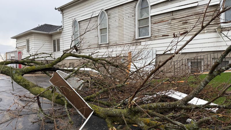 The most visible tornado damage at Lisbon Presbyterian Church off state Highway 164 was to the south exterior wall. Siding was stripped from the wall and debris was piled next to the building. Church leaders were still assessing the damage from the April 14 storm the following morning.