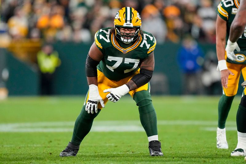Nov 10, 2025; Green Bay, Wisconsin, USA; Green Bay Packers offensive tackle Jordan Morgan (77) during the game against the Philadelphia Eagles at Lambeau Field. Mandatory Credit: Jeff Hanisch-Imagn Images