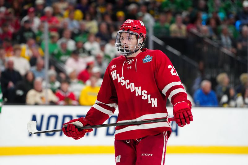 Apr 9, 2026; Las Vegas, Nevada, UNITED STATES; Wisconsin Badgers forward Jack Horbach (22) looks on in the third period against the North Dakota Fighting Hawks in the semifinals of the NCAA men's ice hockey Frozen Four at T-Mobile Arena. Mandatory Credit: Stephen R. Sylvanie-Imagn Images