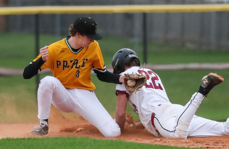 Green Bay Preble High School's Will Dornbush (3) tags De Pere High School's Isaac Herlache (22) as Herlache slides into second base safely on Friday, April 17, 2026, at Aurora BayCare Field in De Pere, Wis. De Pere won the game, 5-3.
Tork Mason/USA TODAY NETWORK-Wisconsin
