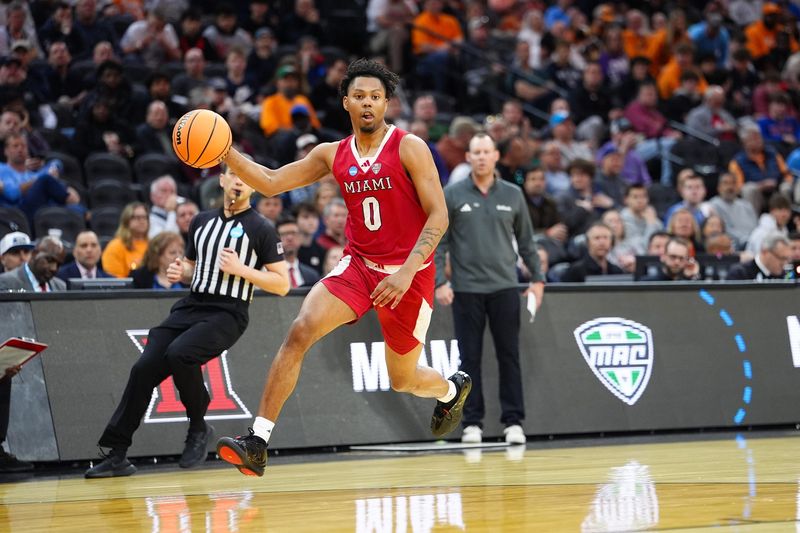 Mar 20, 2026; Philadelphia, PA, USA; Miami (OH) RedHawks forward Eian Elmer (0) dribbles during the second half against the Tennessee Volunteers during a first round game of the men's 2026 NCAA Tournament at Xfinity Mobile Arena. Mandatory Credit: Kyle Ross-Imagn Images
