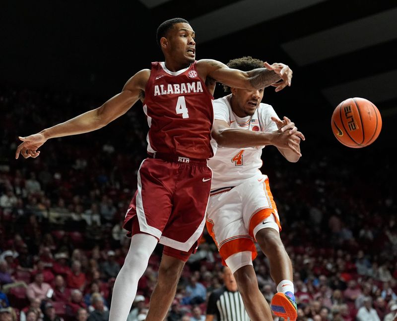 Dec 3, 2025; Tuscaloosa, AL, USA; Alabama guard Davion Hannah (4) and Clemson guard Butta Johnson (4) battle for a ball at Coleman Coliseum. Mandatory Credit: Gary Cosby Jr.-Tuscaloosa News