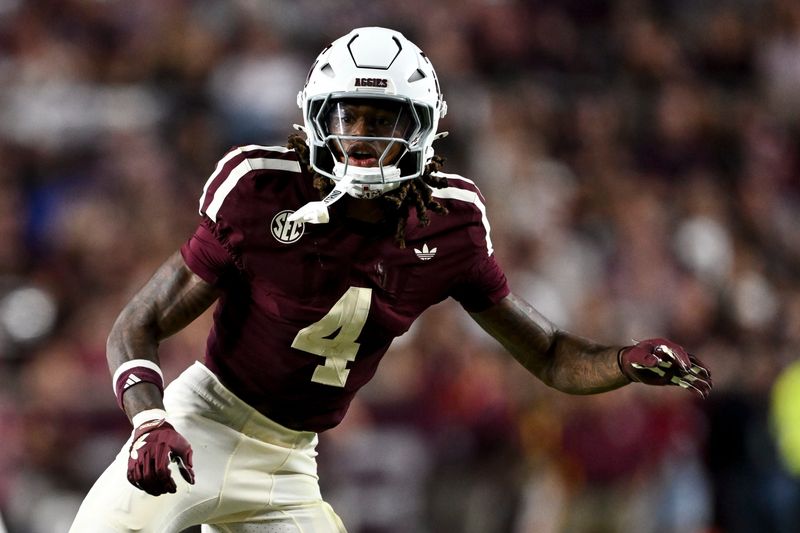 Oct 11, 2025; College Station, Texas, USA; Texas A&M Aggies cornerback Will Lee III (4) defends in coverage during the second half against the Florida Gators at Kyle Field. Mandatory Credit: Maria Lysaker-Imagn Images